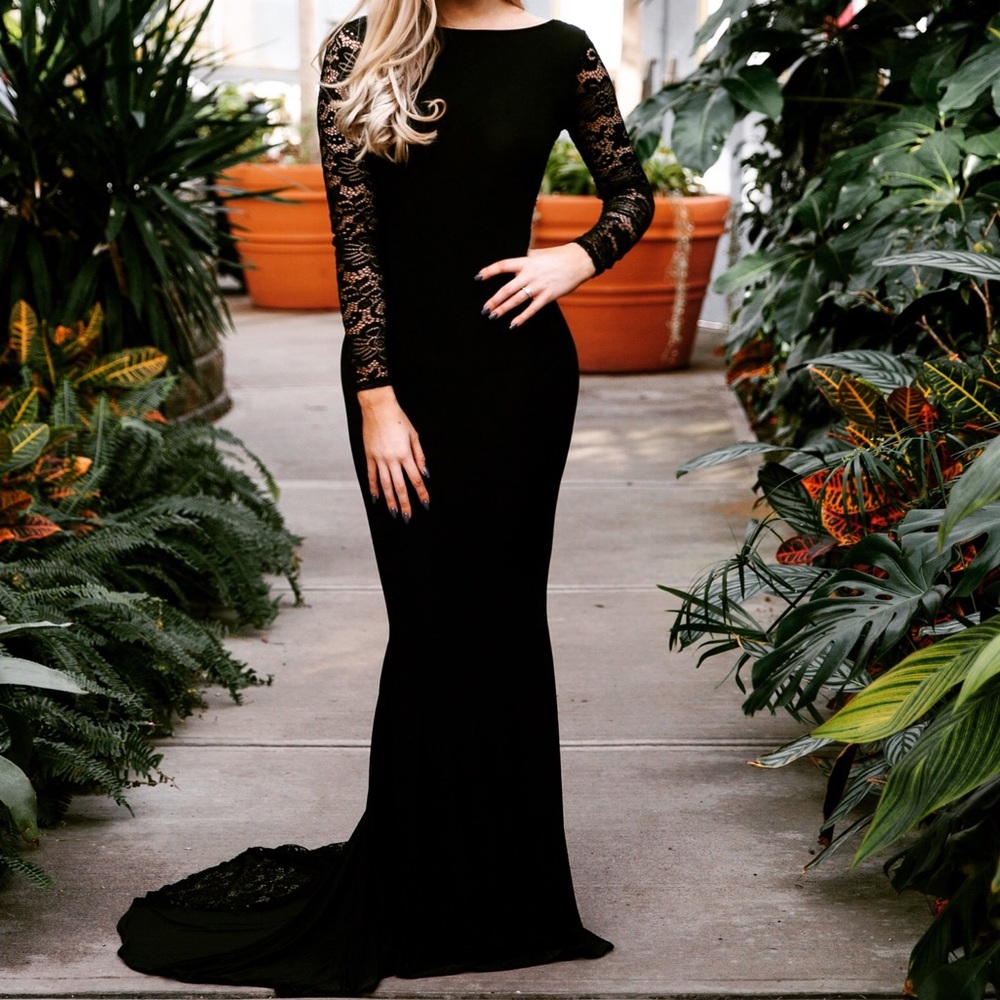 Black spandex gown with low back and lace sleeves